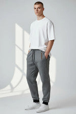 Pantalones de chándal/joggers informales ajustados elásticos de mezcla de algodón con puño de jersey para hombre