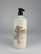 Lavado acondicionador de coco Blossom Pure Haircare 33,8 OZ