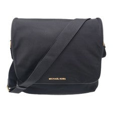Bolso mensajero Michael Kors Kieran de nailon negro