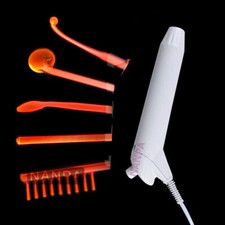 Máquina facial de alta frecuencia para el cuidado de la piel con 5 electrodos de vidrio violeta naranja