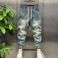 Pantalones de mezclilla clásicos para hombre harén ajustados pantalones de mezclilla sueltos con cordón moda informales 