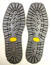 Un par de suelas de goma Vibram Commando Full Stick de calidad premium