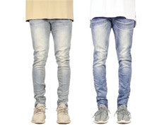 Pantalones de mezclilla ajustados rasgados diseñados a la moda para hombre