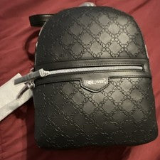 ENVÍO GRATUITO Cartera Mochila Nine West Negra Logotipo Repujado con Estuche para Tarjetas, Cremallera
