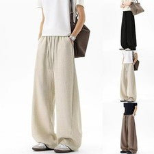 Pantalones deportivos de spandex de poliéster holgados de pierna ancha para hombre