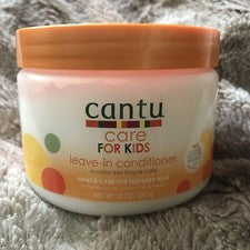 Acondicionador sin enjuague Cantu Care For Kids con manteca de karité, aceite de coco y miel 10 oz