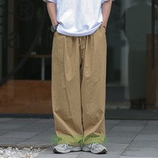 Pantalones deportivos informales estilo japonés sueltos largos de pierna ancha cintura elástica para hombre