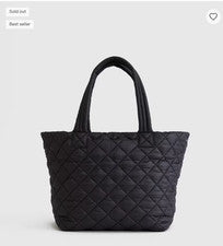 NUEVO CON ETIQUETAS BOLSO DE MANO ACOLCHADO QUINCE TRANSIT NEGRO PRECIO DE VENTA SUGERIDO POR EL FABRICANTE $92 EQUIPAJE