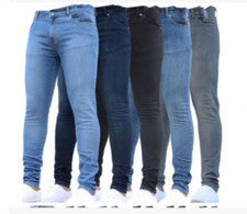 Pantalones de mezclilla ajustados lavados cintura alta ajustados color liso de moda para hombre