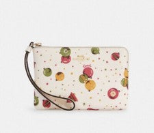 Muñequera Coach adorno navideño estampado esquina cremallera C7406 ELIGE 1 PATRÓN