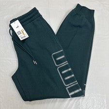 Pantalones deportivos PUMA Essentials para hombre VERDE logotipo metálico talla S