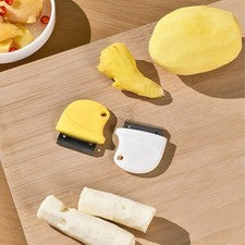 Pelador de verduras de acero inoxidable con orificio para colgar para facilitar su almacenamiento