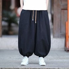 Pantalones holgados estilo chino de algodón y lino para hombre con cordón sueltos pantalones de pierna ancha