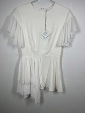 Mini vestido blanco By Egreis mangas aleteadas transparentes dobladillo asimétrico talla S