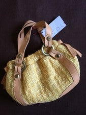 Bolso clutch Nicole amarillo mezcla