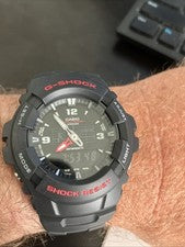 Casio G-Shock Reloj Hombre WR 200M Negro Rojo Analógico Digital 5158 G-100 con Caja Papel