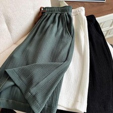Pantalones cortos holgados de seda helada de secado rápido cintura elástica cordón para hombre
