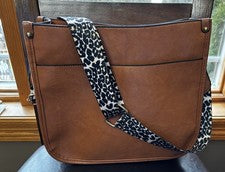 Bandolera de moda boutique coñac con correa de guitarra cierres de cremallera nueva con etiquetas