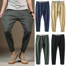 Pantalones chinos informales holgados para hombre pantalones elásticos de color liso harén