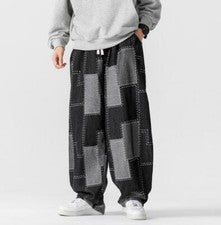 Nuevo Pantalones de mezclilla sueltos de jacquard parche de moda juvenil para hombre Pantalones largos