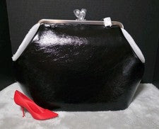 Bolso Coach Kisslock Marco Grande Devil Wears Prada 2 Negro Cuero Esmaltado Limitado