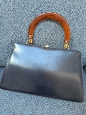 Bolso de mano vintage de cuero azul marino Continental London años 60 mango de baquelita en caja