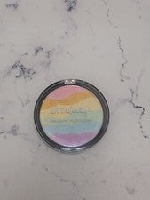 Iluminador en polvo prensado arco iris Ulta Beauty sellado