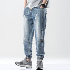 Pantalones de mezclilla clásicos harén para hombre pantalones de mezclilla sueltos con cordón pantalones informales moda