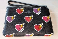 Muñequera COACH Esquina Cremallera Corazón Rayo Estampado CW857 Plateada/Negro Multi