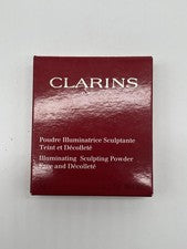 Clarins Polvo Iluminador Esculpidor Compacto Cara Y Decolette - 0.1oz
