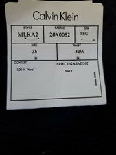Pantalones de vestir de lana estilo MLKA2 Calvin Klein azul marino dobladillo crudo para hombre talla 32W