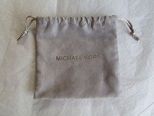 Bolso de almacenamiento de joyas Michael Kors con cordón gris plata nuevo