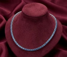 Collar de tenis para mujer de zafiro creado en laboratorio de corte redondo de 15 quilates enchapado en oro blanco de 14