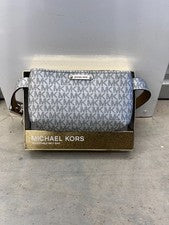 Riñonera de viaje Michael Kors unisex con logotipo plateado correa ajustable nueva con etiquetas