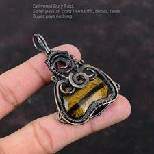 Chakra sacro de cobre ovalado ojo de tigre piedra única envuelta en alambre colgante joyería