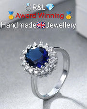 Talla T-U, Anillo de oro blanco*mujer. Azul ovalado creado en laboratorio, zafiro envolvente blanco
