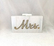 Bolso clutch nupcial de acrílico blanco con estampado dorado y asa de cadena dorada