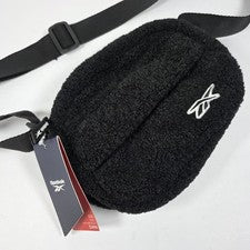 Bandolera Reebok Dani Sherpa polar negra 2,2 L nueva con etiquetas correa ajustable