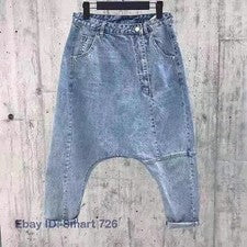 Moda Hombres Pantalones de mezclilla Harén Pantalones sueltos Irregulares Caída Entrepierna Jeans Cónicos
