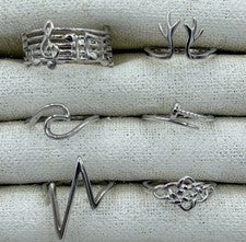 Anillo de plata esterlina 925 astas onduladas celtas clavo latido del corazón notas musicales varias