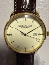 Reloj de Vestir Stuhrling Original GGI-L Ascot Ajustado Tono Dorado Esfera Champagne Marrón