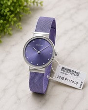 Reloj para mujer Bering Classic 10131-909 esfera lavanda malla acero inoxidable