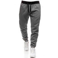 Pantalones de cintura elástica estampados de moda lisos deportivos a juego de colores de moda para hombre