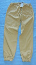 RARO NUEVO CON ETIQUETAS PANTALONES JOGGER BALDWIN THE CASH CAQUI talla 32 HECHOS EN EE. UU.