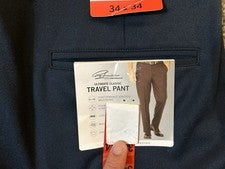 Pantalones de viaje Greg Norman estilo chino delantero plano azul Ultimate 34x34 para hombre nuevos con etiquetas