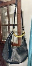 Bolso hobo de hombro de cuero Jane con logotipo dorado negro Walter Baker para mujer