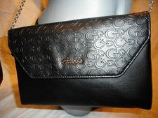 Cartera sin asas para mujer Guess Factory negra con logotipo cruzado
