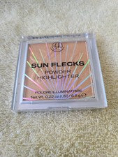 Sujetador Revolution Beauty Los Angeles Sun Flecks Polvo Iluminador Golden States