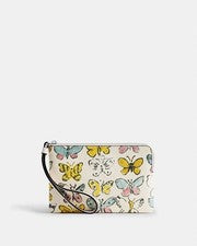 💛 Muñequera Coach Corner Cremallera - CAQ55 Amarillo Tiza Mariposa Impresa Lona - Nueva con Etiquetas