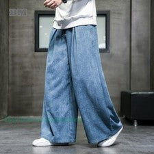 Pantalones informales de pana de gran tamaño estilo chino retro de pierna ancha para hombre